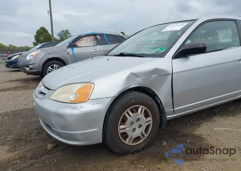 2002 Honda Civic Lx из США, поврежденный, VIN 1HGEM22592L082490